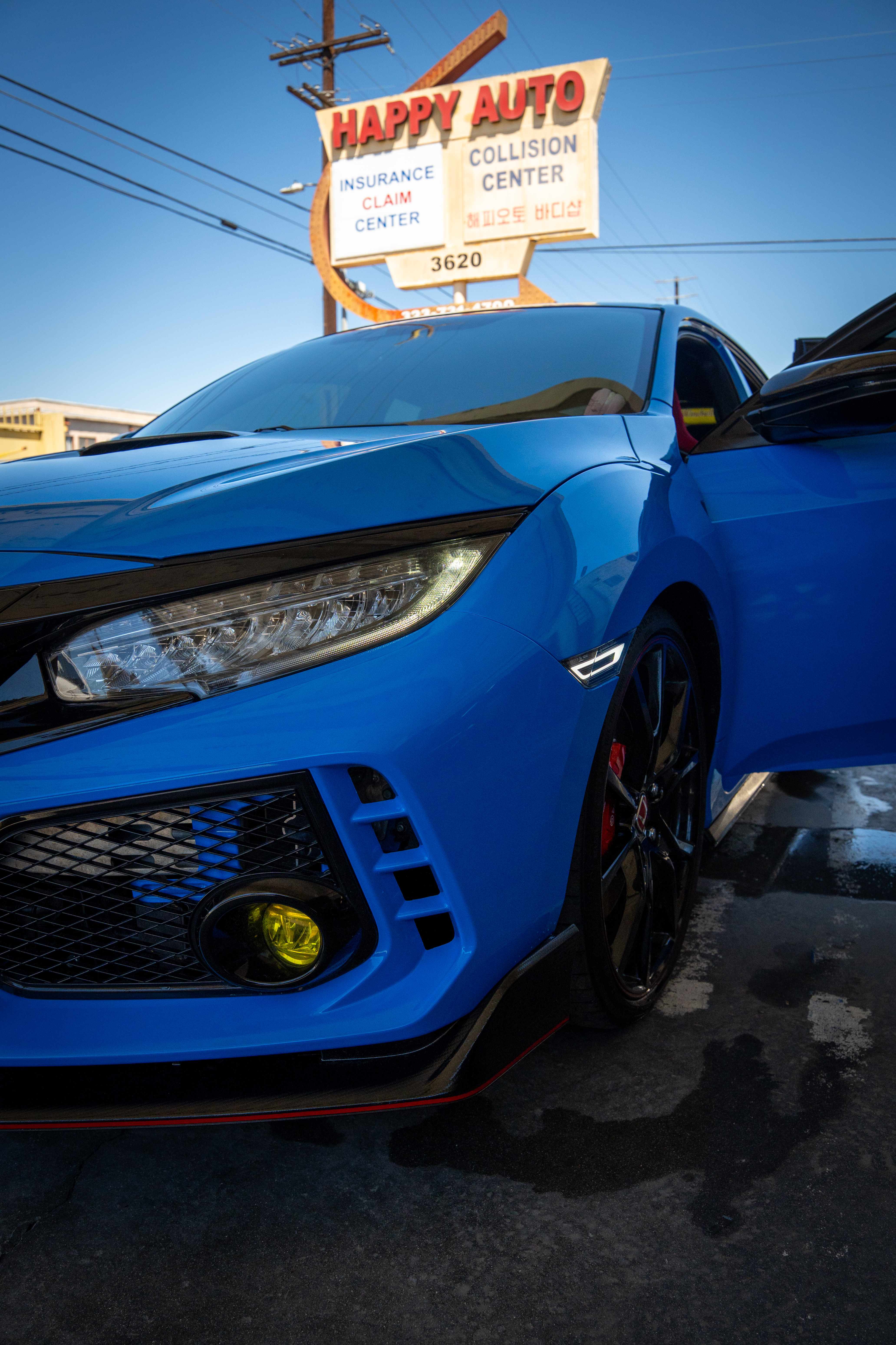 After: blue Honda Civic Type R front-end collision repair